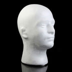 Educational display of male foam head with scarf and wig