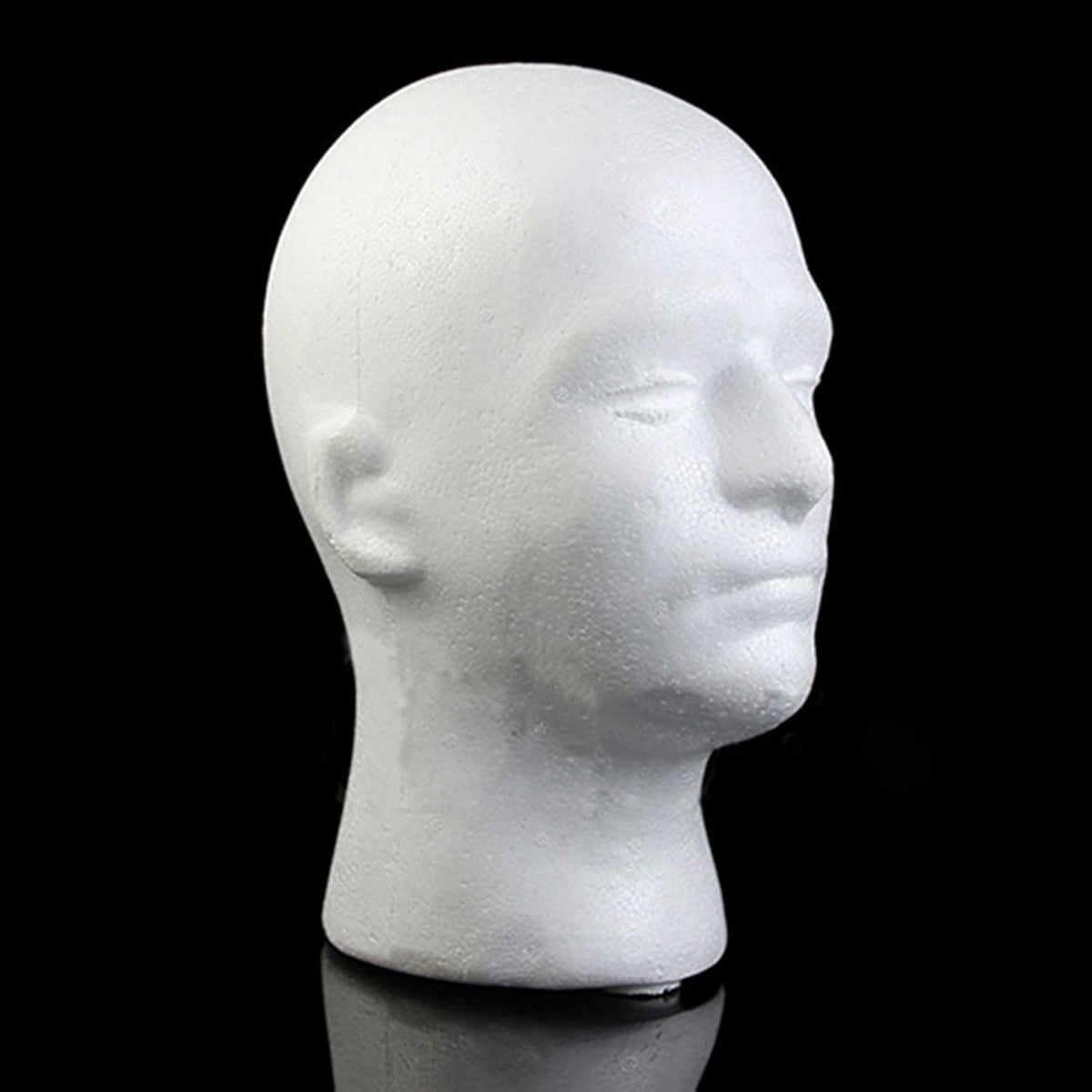 Educational display of male foam head with scarf and wig