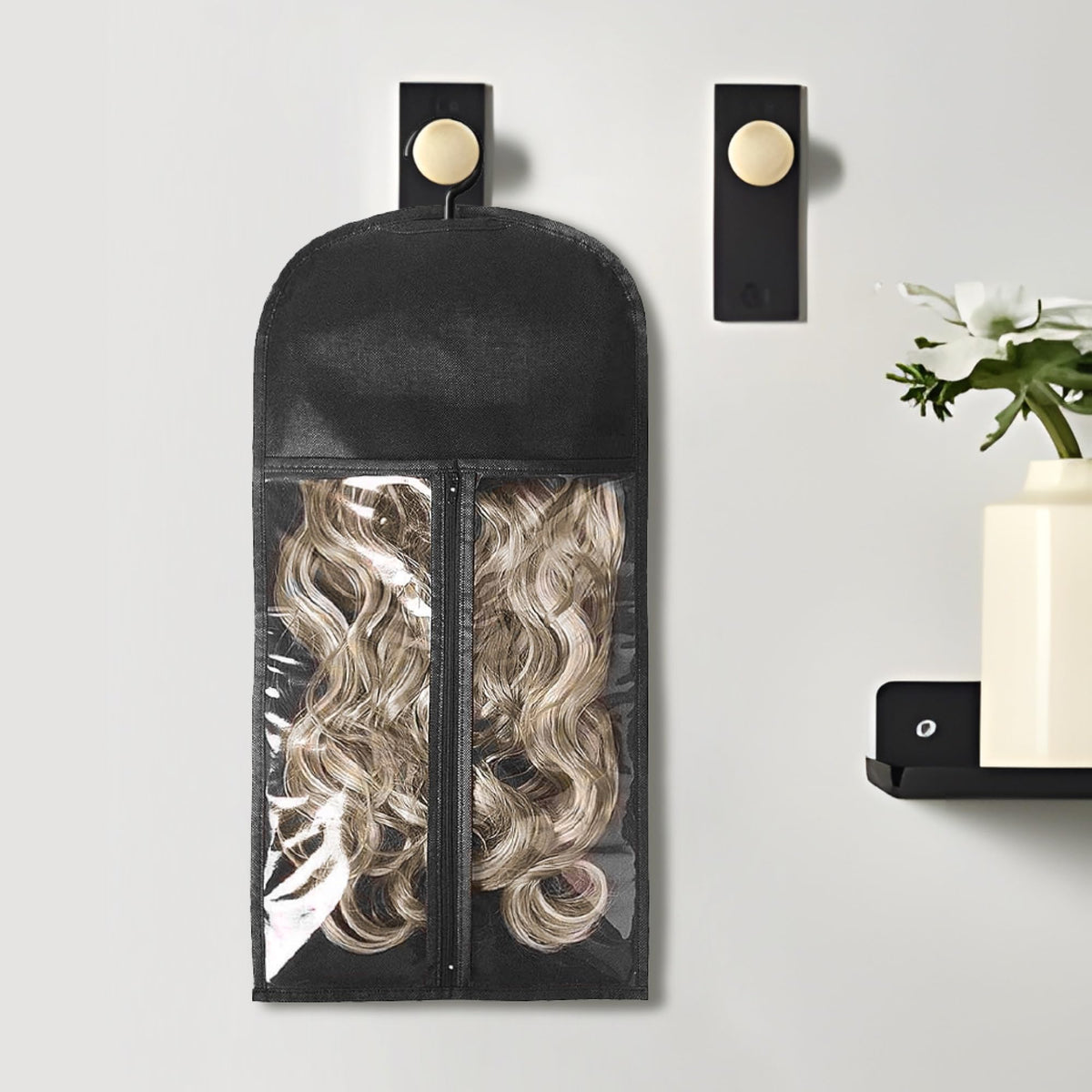 AIHOPESTO travel friendly wig holder set showing the flexible material folded gently for compact packing inside luggage or bags.