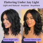 Back view of the shoulder length wave pattern on the AISI HAIR natural black synthetic wig