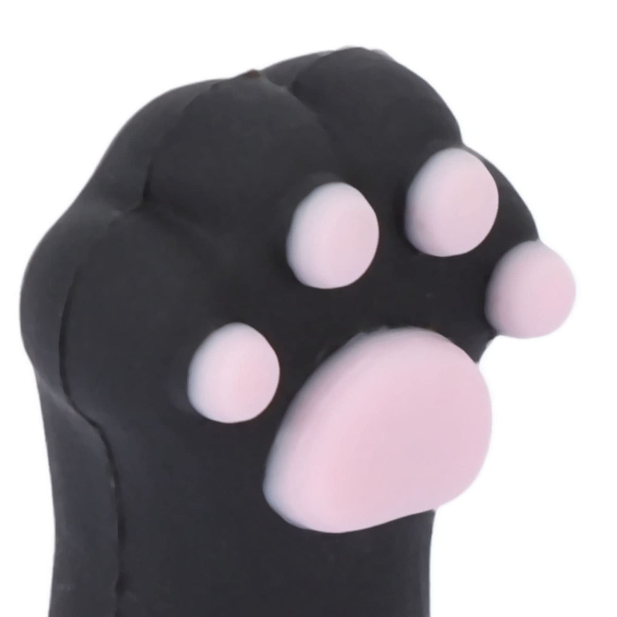 A complete set of five cat paw shaped nail scissor protectors next to a vanity pouch