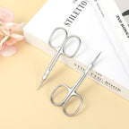Premium rust resistant manicure and pedicure tool kit highlighting the polished metallic finish of the scissors.