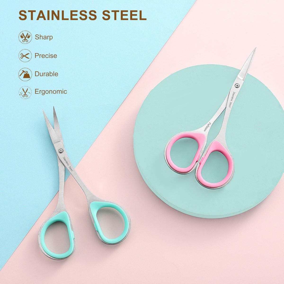 Ergonomic rubber ring handles on the stainless steel cuticle scissors demonstrating comfortable finger grip.