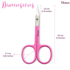 Stelone stainless steel curved scissors placed flat next to a professional manicure kit