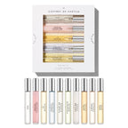 Ten piece Le Monde Gourmand fragrance gift set showing diverse scent labels.