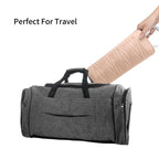 Compact pink silicone styling station pad packed flat inside a travel luggage bag