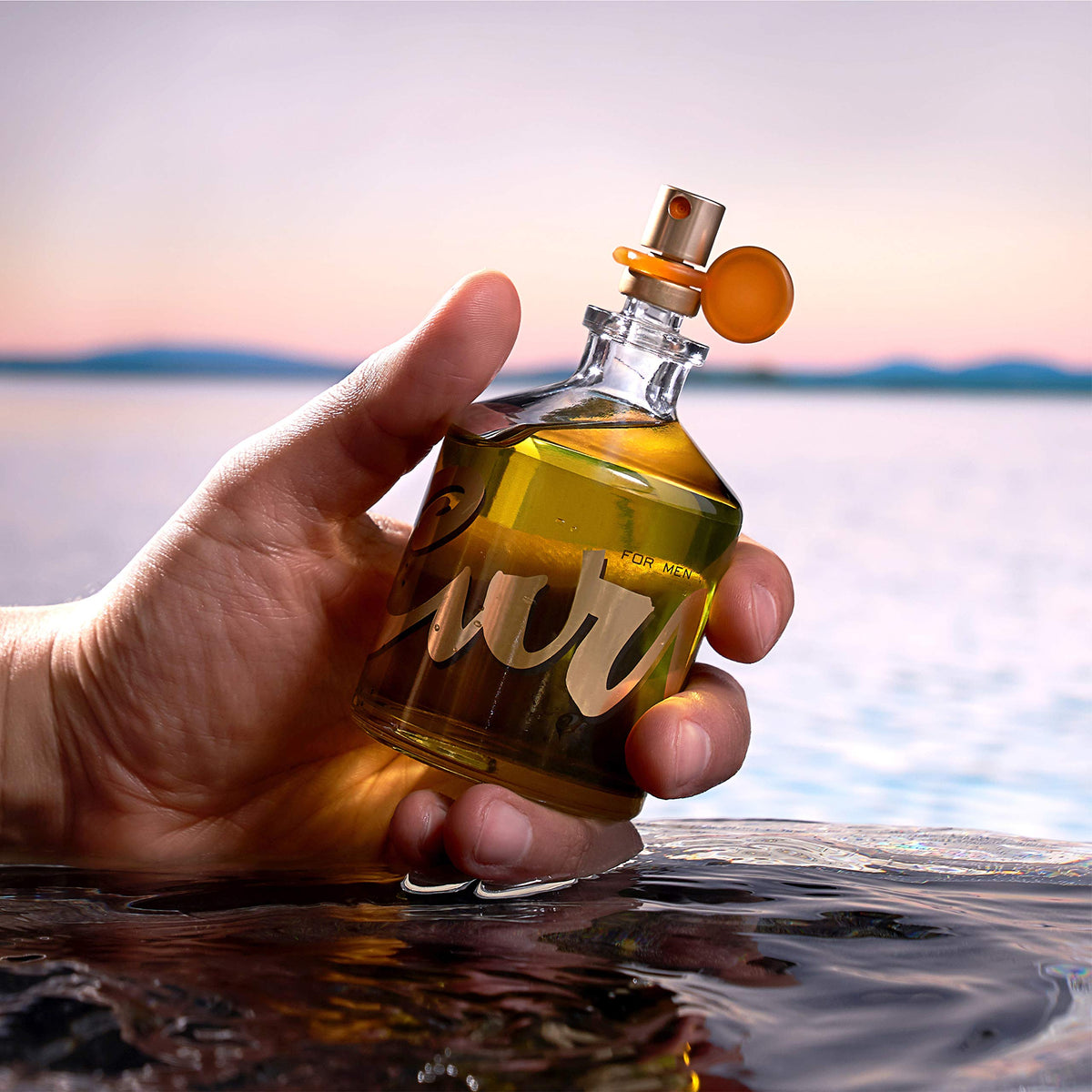 Liz Claiborne everyday signature fragrance bottle for men illustrating the sleek modern glass construction