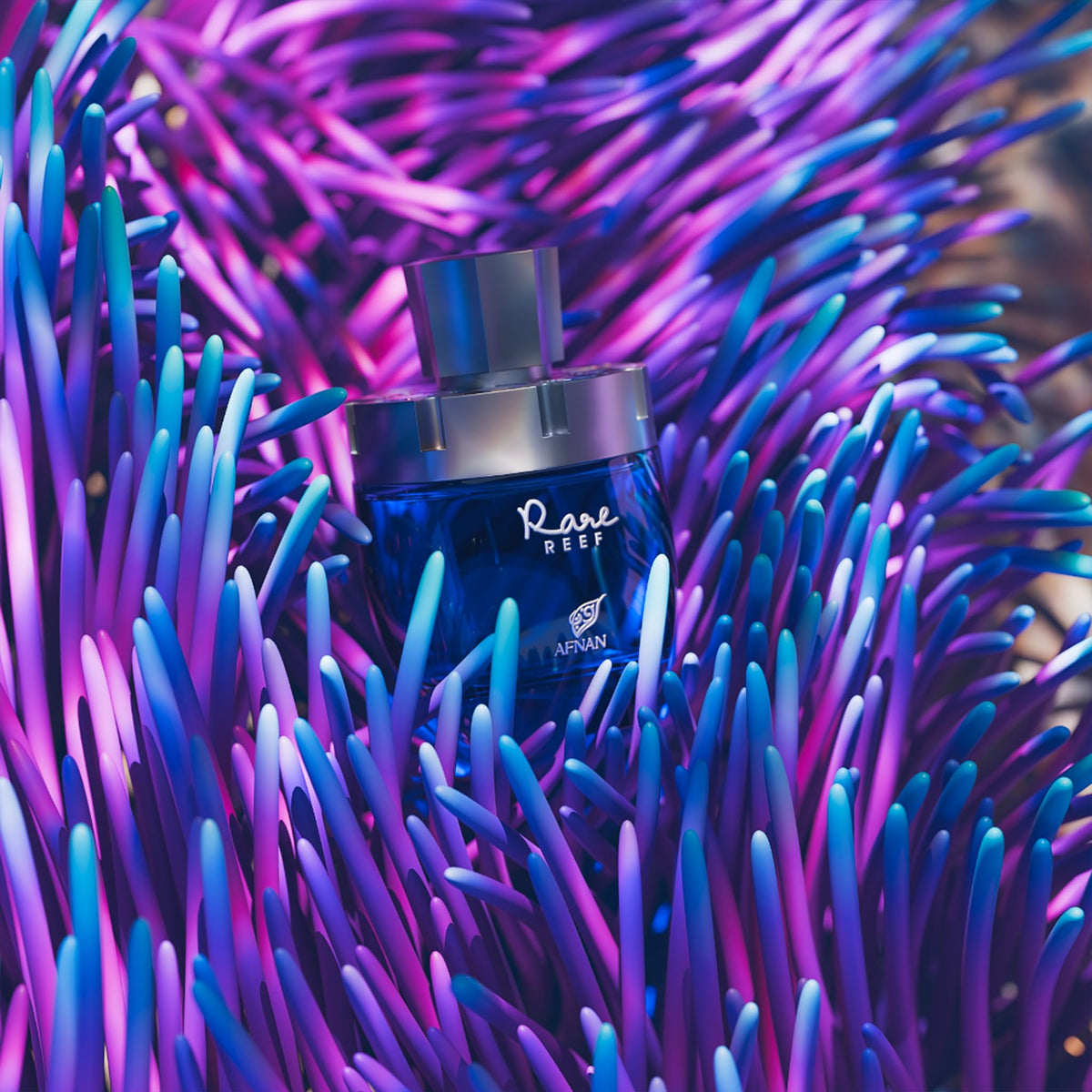 Afnan Rare Reef high concentration long lasting perfume bottle reflecting light beautifully