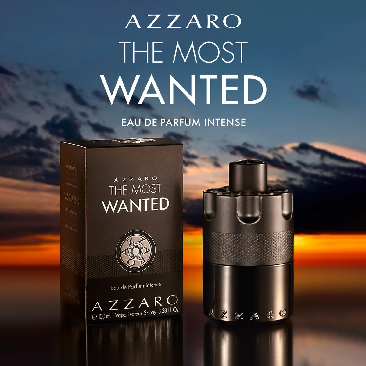 Luxury black barrel bottle of Azzaro mens fragrance alongside its original retail packaging box