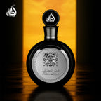 Lattafa Fakhar Black bottle displaying the authentic brand engraving and fluid ounces