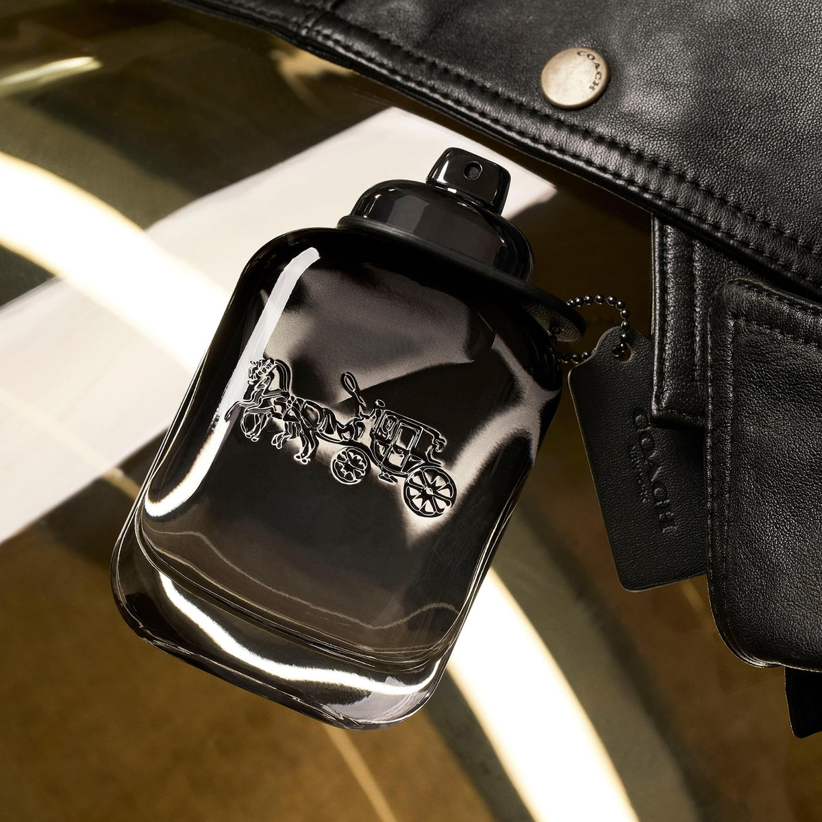 Close up shot of the spray nozzle on Coach for Men Eau de Toilette bottle