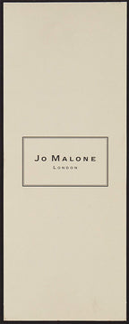 Jo Malone Nectarine Blossom and Honey 30ml glass bottle on vanity