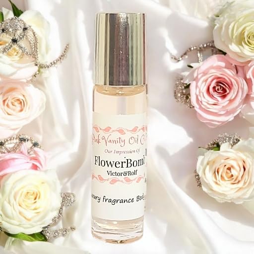 Compact ten milliliter glass bottle of imported luxury body oil fragrance on plain background