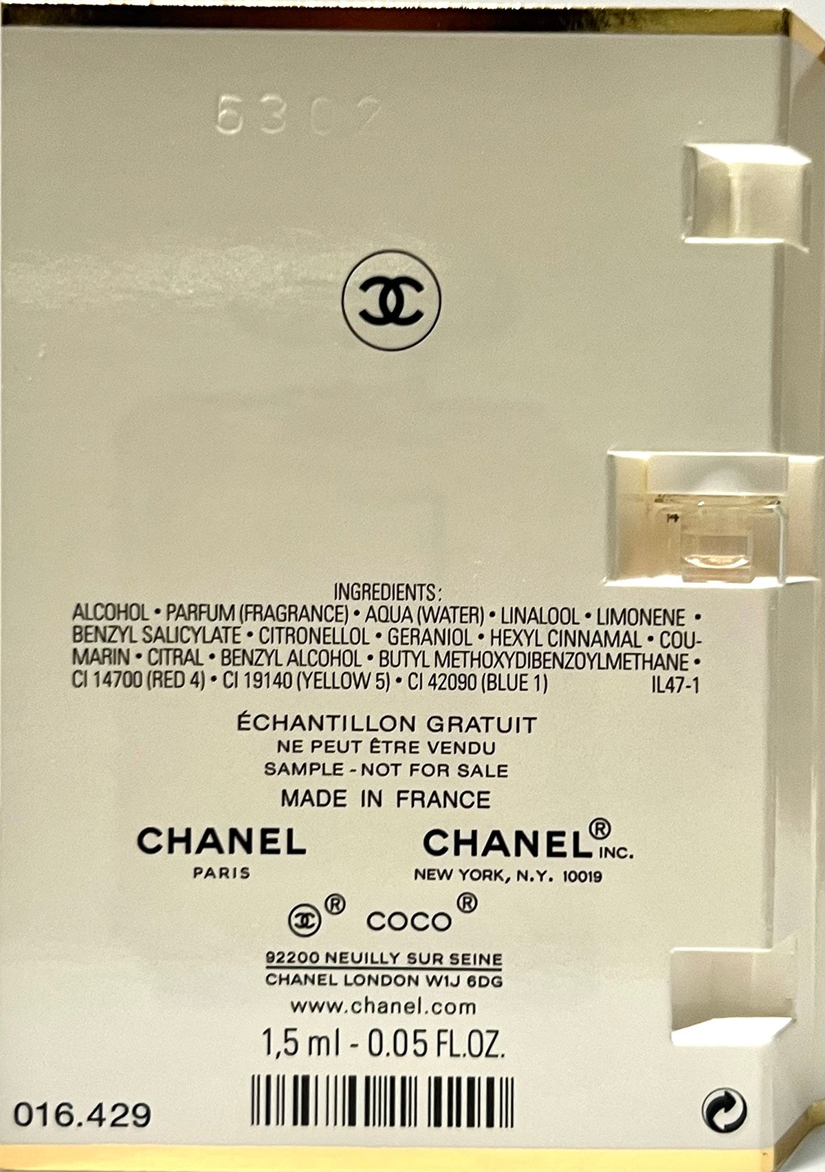 Chanel travel size fragrance spray for women on a flat lay background