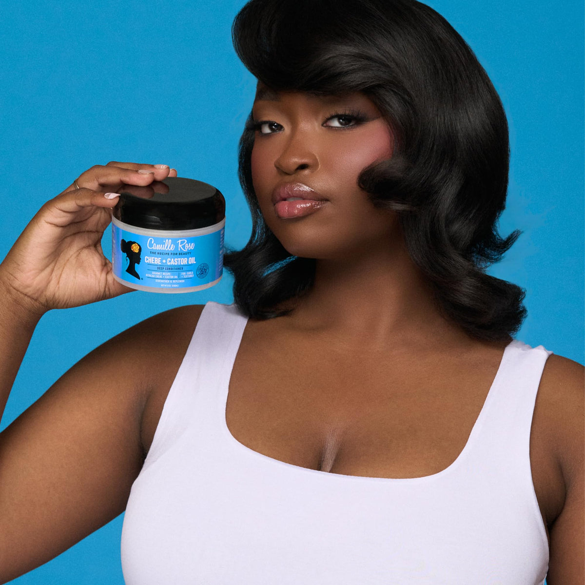 Camille Rose deep hair conditioner for curly hair showing full product labels and text.