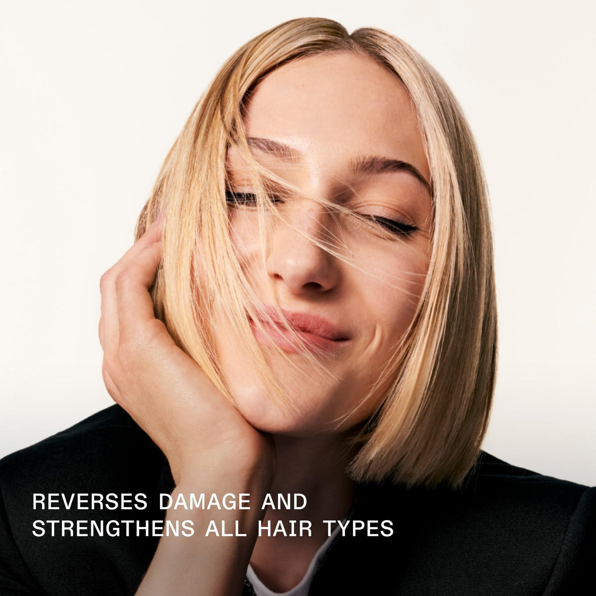 Back label of Olaplex repairing hair treatment showing genuine product ingredients.