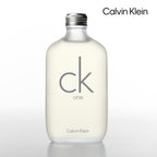 Calvin Klein CK One bottle with citrus and green tea leaves