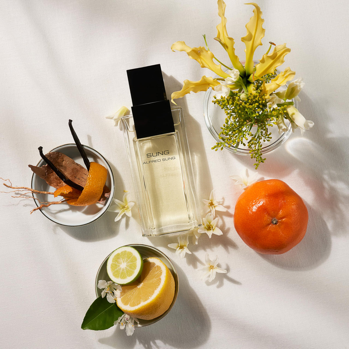 Elegant Alfred Sung 3.4 Fluid Ounce perfume bottle