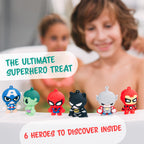 Collectible superhero toy keychains including Captain America and Iron Man styles displayed next to dissolved bath bomb elements