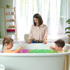 The clean and residue free bathtub water draining safely down the plug after a sensory play session.