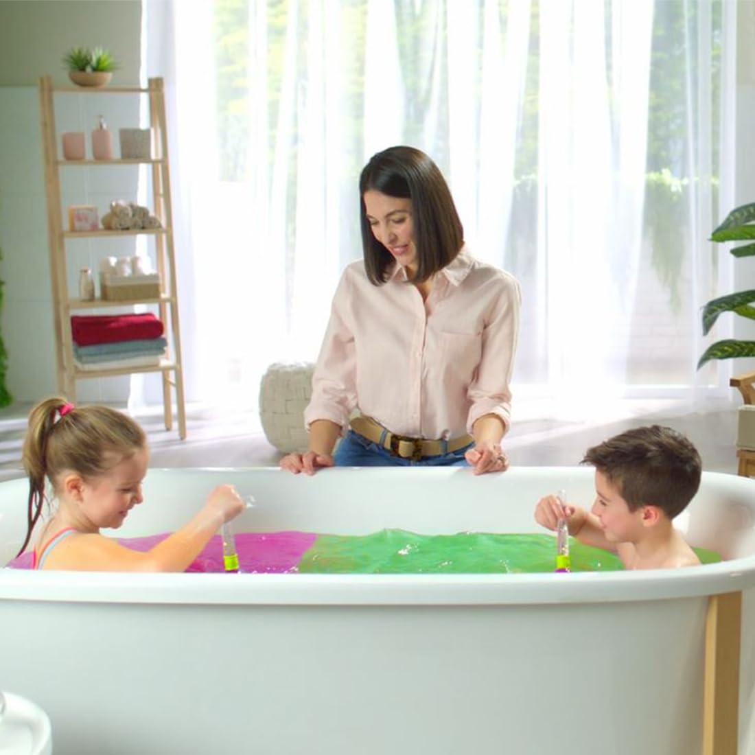 The clean and residue free bathtub water draining safely down the plug after a sensory play session.