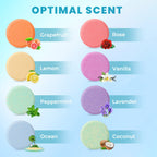 Aromatherapy shower bomb tablet dissolving on a bathroom floor releasing steam vapors