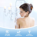 An organic essential oil shower steamer dissolving smoothly on a bathroom floor releasing therapeutic aroma steam.