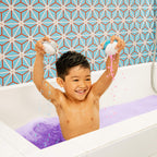 Munchkin bath water color tablets enriched with moisturizing Vitamin E and shea butter.