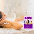 Close up view of Calgon bath crystals packaging showing vitamin E and aloe indicators