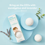 Frida Baby BreatheFrida vapor bath bomb dissolving in warm water creating a soothing fizzy experience.