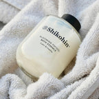 SHIKOHIN aromatherapy bath soak bottle displayed for lifestyle relaxation