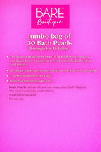 Assorted animal heart and star shaped moisturizing bath beads spread out on a flat surface