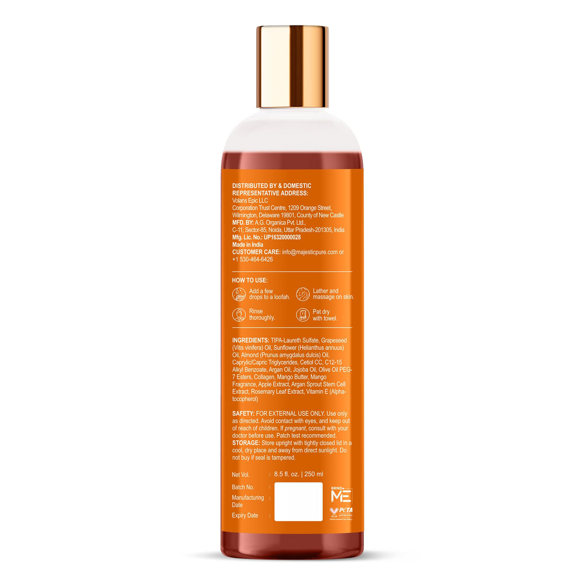 Majestic Pure mango butter body wash bottle displaying product details and size.