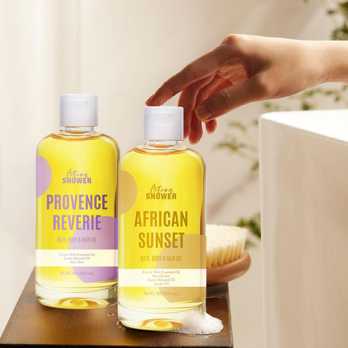 Autumn Shower body oil bottle highlighting its use as a hydrating hair oil treatment