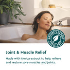 Back label of Kneipp arnica joint oil with vegan ingredients and instructions