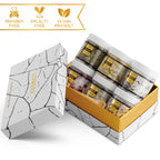 Six piece luxury self-care collection unboxed showcasing the variety of natural herbal scents for body care.