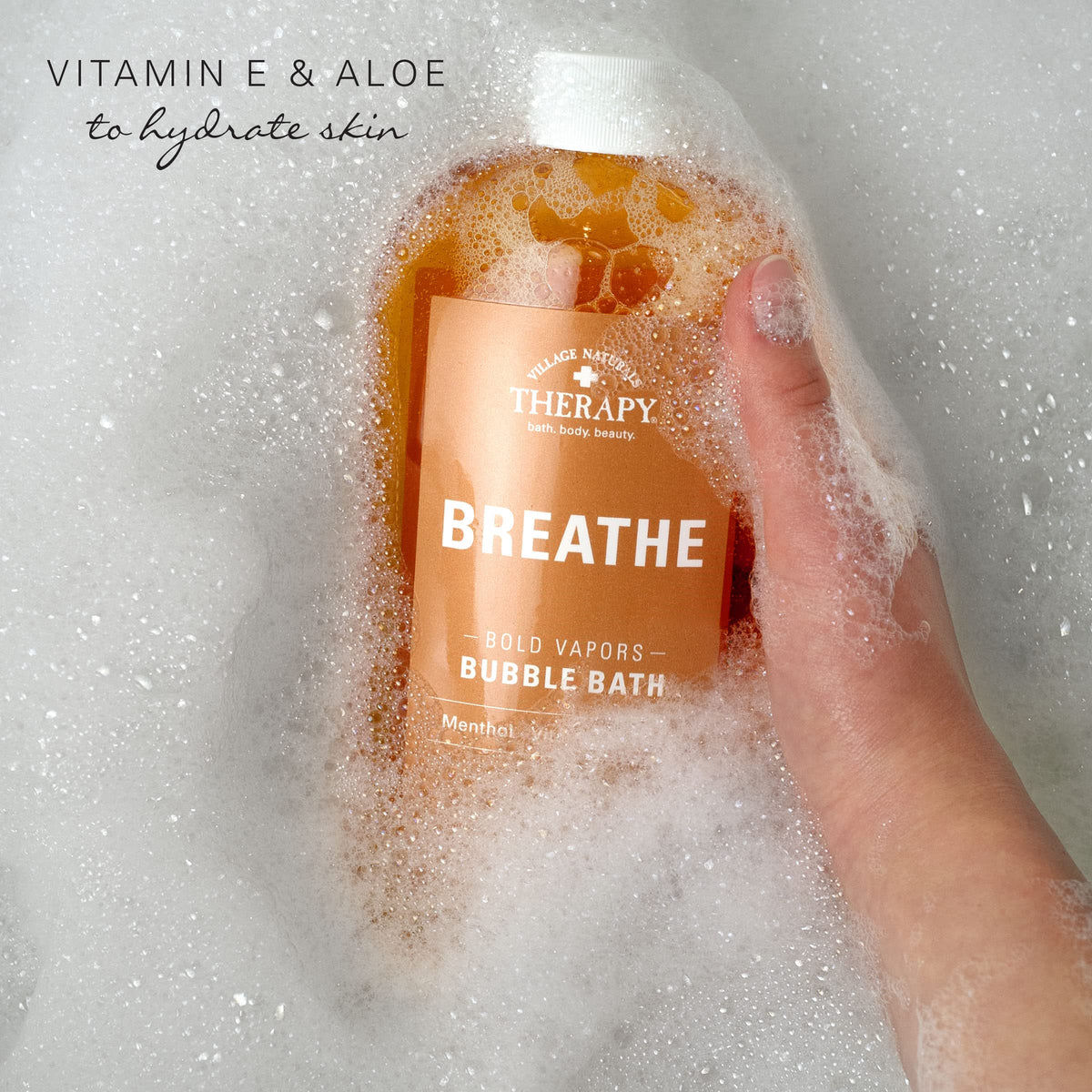 Side profile of Village Naturals Therapy Breathe bottle 20 fluid ounces.