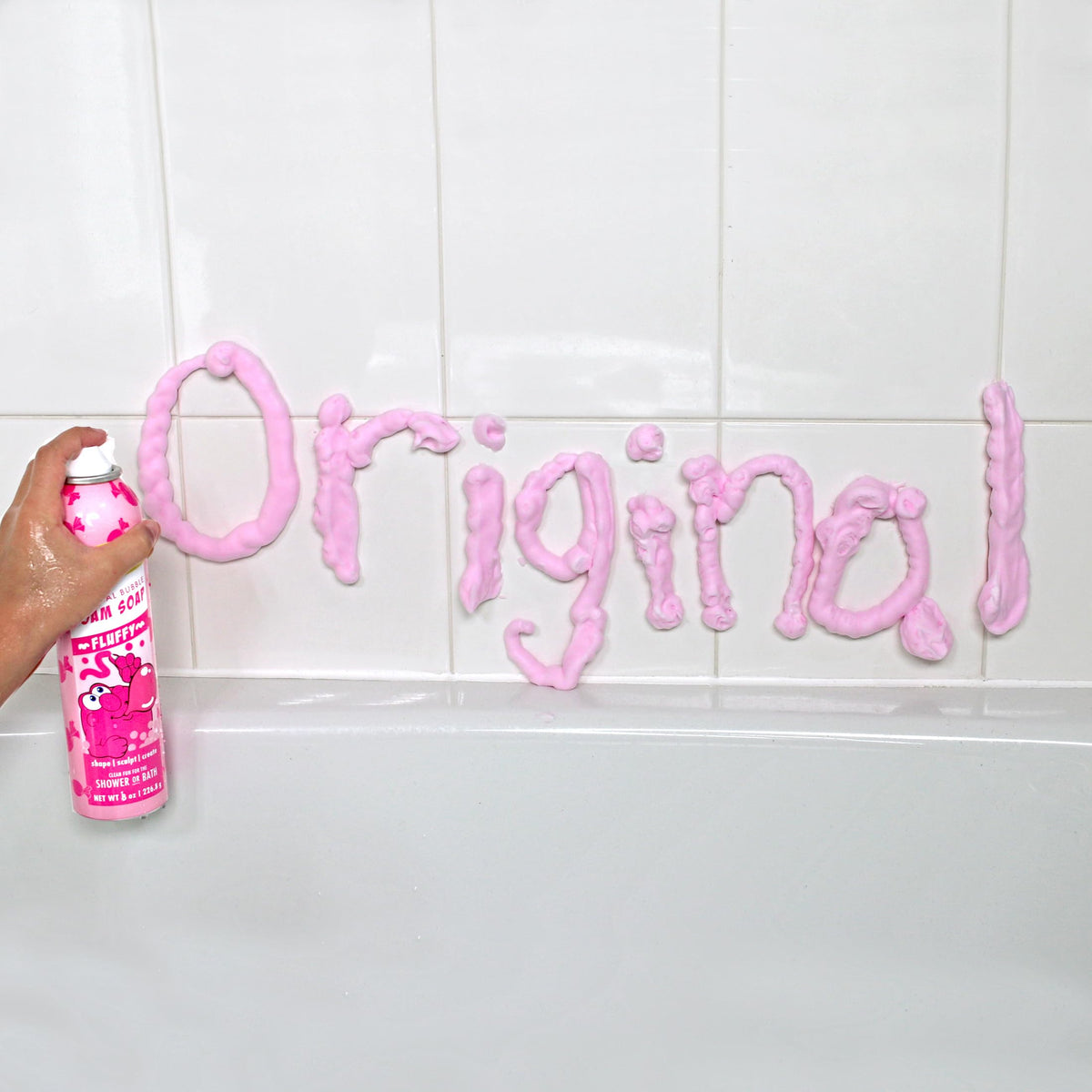 Child using Mr. Bubble foam soap to sculpt shapes in the bathtub