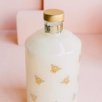 Close up of Lollia Wish bubble bath label with bee illustration