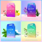 Individually wrapped natural essential oil shower tablets arranged by color and fragrance.
