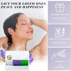 Aromatherapy tablet dissolving on a shower floor releasing essential oil steam