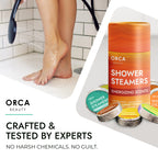 Natural menthol and peppermint vapors rising from an active shower tablet