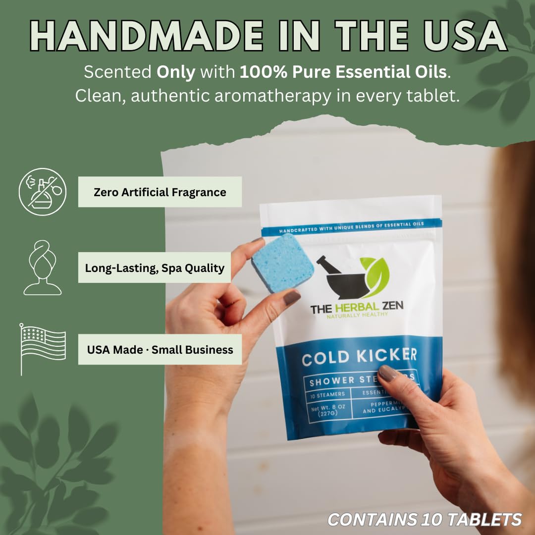 The Herbal Zen peppermint and eucalyptus shower bomb tablets placed on a bathroom floor releasing vapors
