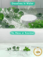 Seonnix shower bombs tablet dissolving on a bathroom floor under warm water steam.
