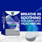 Back packaging details of Vicks VapoShower Max showing essential oil ingredients and usage steps