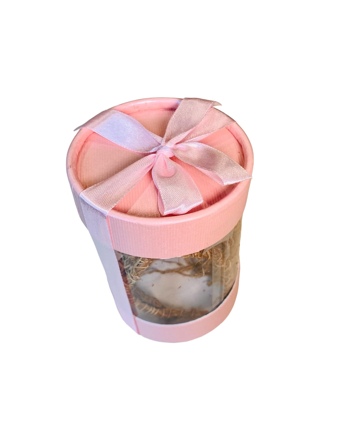 Al Badil premium grade vetiver roots in glass display.