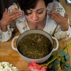 Handcrafted herbal bath tea bag in a relaxing home spa setting