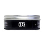 Open container of Uppercut Deluxe strong hold low shine styling clay.
