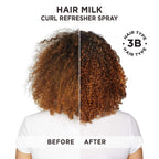 Black trigger spray bottle nozzle of Carol's Daughter curl reviving formula