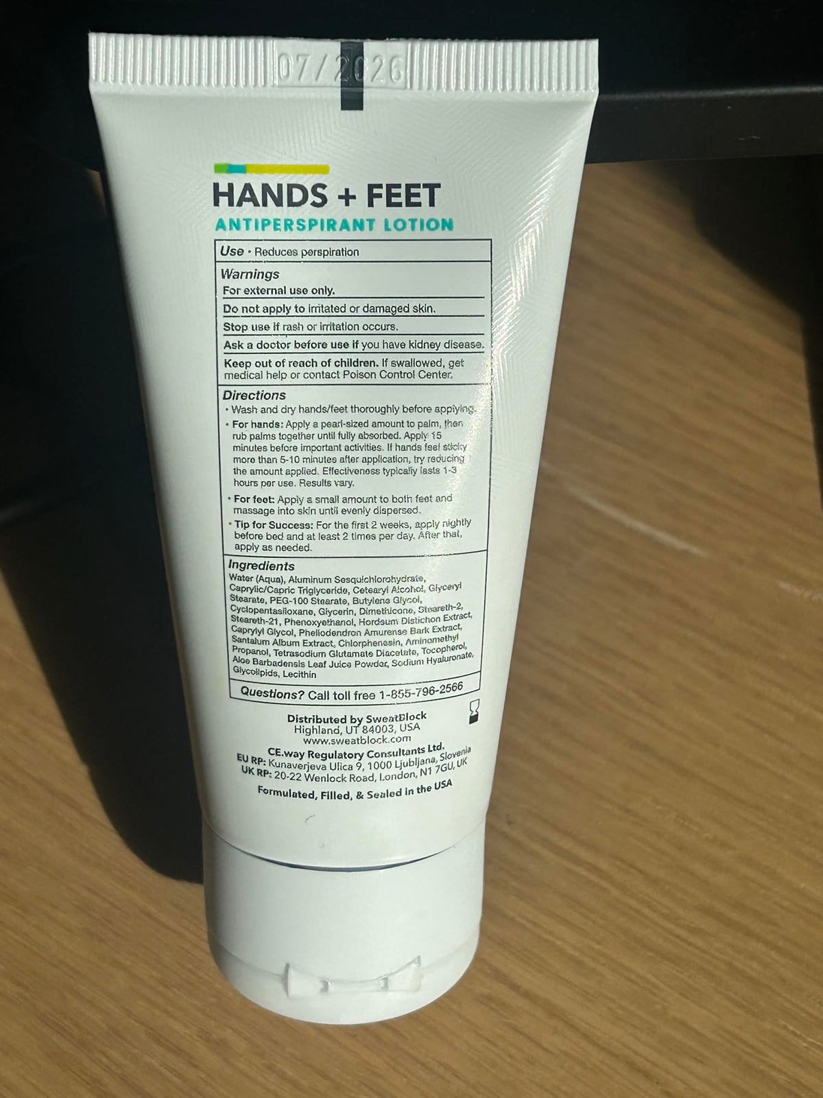 Travel-sized SweatBlock clinical strength lotion in hand